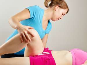 Osteopathy treatment the professional masseur and his patient